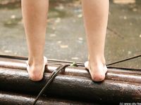 Feet - Irina - 2005-08-23 Barefoot walk under the rain