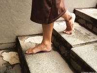 Feet - Liza C - 2017-12-08 Barefoot in the wet street