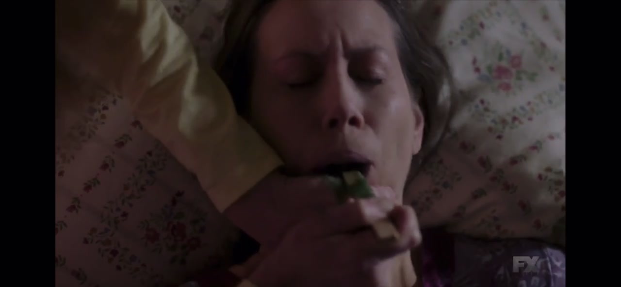 Woman smothers woman