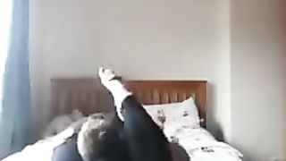 Girlfriend reverse headscissors her boyfriend in sexy leggings
