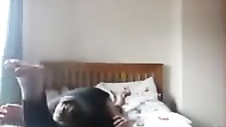 Girlfriend reverse headscissors her boyfriend in sexy leggings