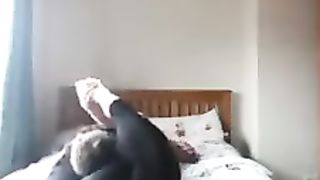 Girlfriend reverse headscissors her boyfriend in sexy leggings