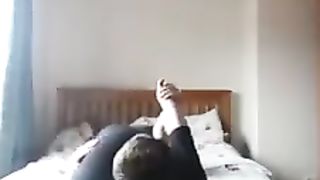 Girlfriend reverse headscissors her boyfriend in sexy leggings