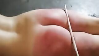 Lezdom - slave girl Getting the Cane