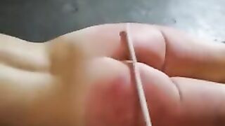 Lezdom - slave girl Getting the Cane