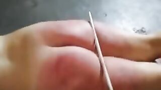 Lezdom - slave girl Getting the Cane