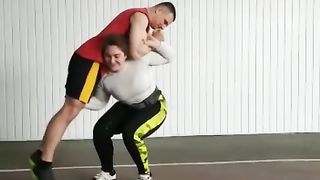 strong women lift guy overhead