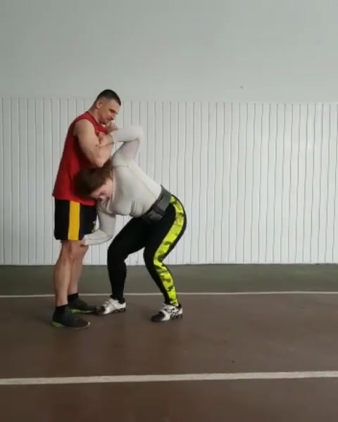 strong women lift guy overhead