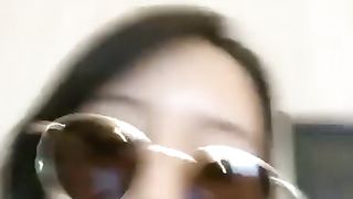 Pretty asian mistress humiliating her foot slave