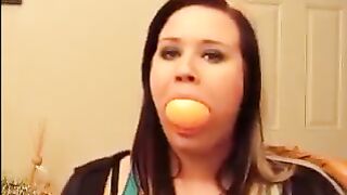 chubby beauty testing her mouth capacity.. (rare)
