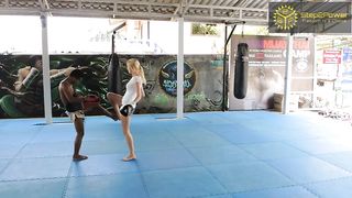 Muay Thai accidental front kick to balls