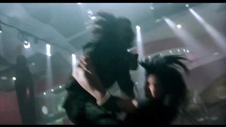 Martial arts mixed fight in black dress