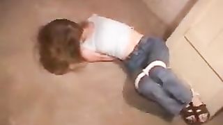 Sexy long hair girl bound gagged and blindfolded with black tape