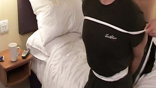 Female brutally hogties male