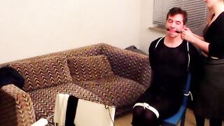 She ties him securely to a blue chair 30