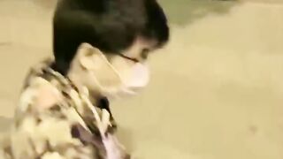 Chinese mistress feeding her dog in public