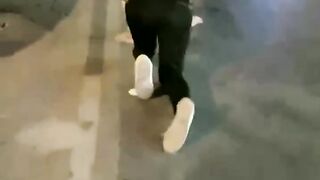 Chinese mistress feeding her dog in public