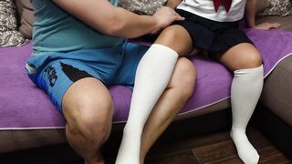 Man caressing schoolgirl in stockings under panties uniform roleplay