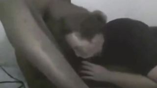 Interracial couple having sex