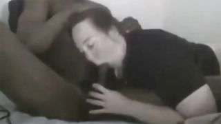 Interracial couple having sex