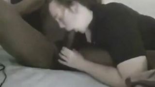 Interracial couple having sex