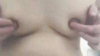 Mature playing with extreme big nipples