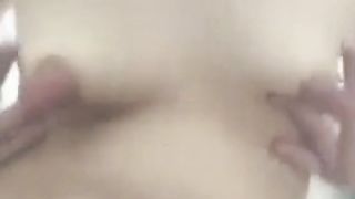 Mature playing with extreme big nipples