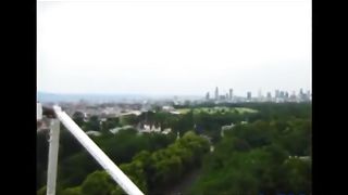 Cheerful beauty flashing in amusement park