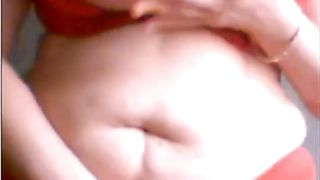 Fingering a woman in front of webcam