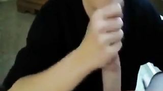 Girl jerks off her boyfriend and takes load in mouth