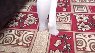 Schoolgirl in White Kneesocks Shows itself