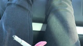 Smoking and barefooted in the car