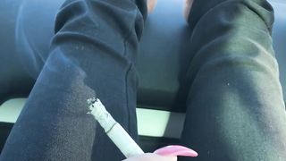 Smoking and barefooted in the car