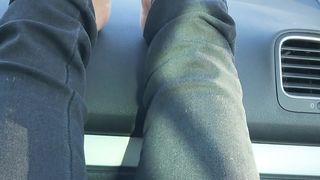 Smoking and barefooted in the car