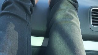 Smoking and barefooted in the car