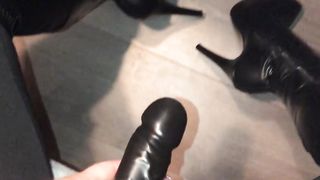 Teaser in Shiny leggings, overknee boots and a nice big strap-on ready to be used
