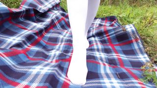 Schoolgirl in Uniform Shows Legs Feet Foot in White Knee Socks and Pantyhose under Skirt