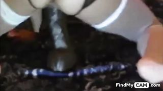 Woman stuffs her juicy pussy with big brown dildo 2