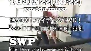 Asian girl boxes and kicks male opponent