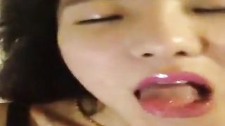 Freaky Asian girl pleasuring herself - selfie