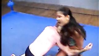 Asian girl dominates white guy in the ring