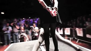 Women twerk on tied men