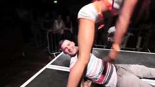 Women twerk on tied men