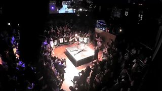 Women twerk on tied men