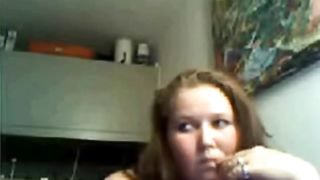 Chubby chick showing her tits on webcam