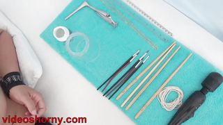 Cute neck chain inserted in cervix with speculum on