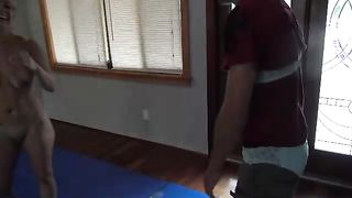 Wild girl with strong legs in mixed headscissor