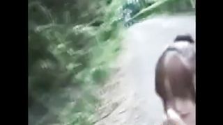 Asian couple fuck outside