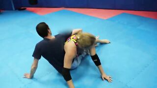 Strong nice fitness girl vs man headscissor wrestling