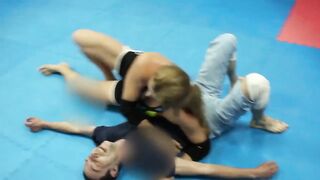 Strong nice fitness girl vs man headscissor wrestling